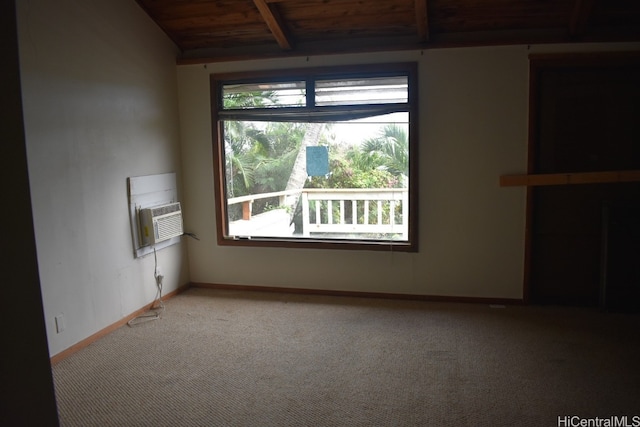 carpeted spare room featuring a wealth of natural light, beamed ceiling, cooling unit, and wood ceiling