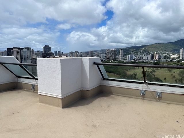 balcony featuring a mountain view