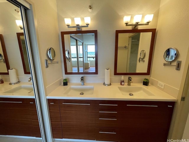 2499 Kapiolani Blvd Unit 3001, Honolulu, HI 96826 - bathroom featuring a sink and double vanity