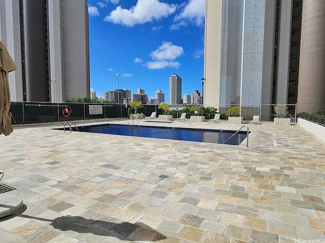 2499 Kapiolani Blvd Unit 3001, Honolulu, HI 96826 - pool with a patio area and a view of city