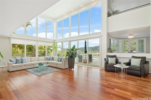 sunroom / solarium featuring a mountain view