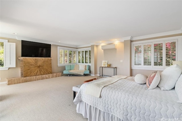 bedroom featuring carpet, a wall mounted AC, and ornamental molding