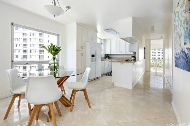 view of tiled dining space