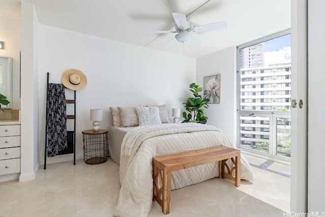 tiled bedroom with ceiling fan