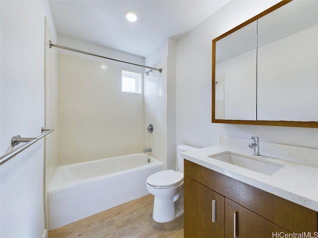 full bathroom featuring toilet, shower / tub combination, vanity, and hardwood / wood-style floors