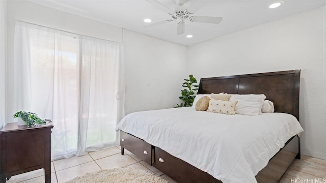 bedroom with light tile patterned floors and ceiling fan