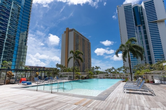 view of swimming pool featuring a patio area