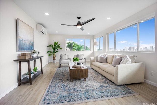 1849 Vancouver Pl, Honolulu, HI 96822 - living room with baseboards, a ceiling fan, light wood-style floors, and a wall mounted AC
