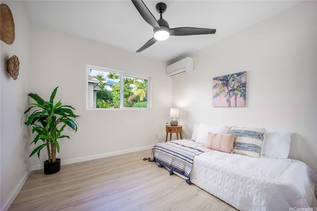 1849 Vancouver Pl, Honolulu, HI 96822 - bedroom featuring baseboards, wood finished floors, a wall unit AC, and ceiling fan