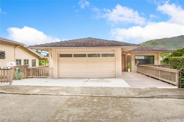 garage featuring a mountain view