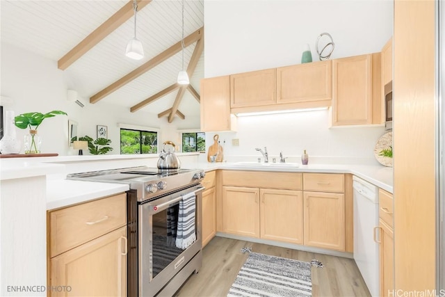 kitchen featuring light hardwood / wood-style floors, light brown cabinetry, sink, and appliances with stainless steel finishes