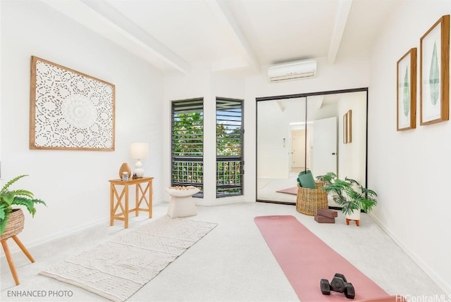 workout room with a wall mounted air conditioner and carpet