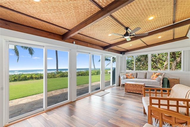 61-707 Papailoa Rd, Haleiwa, HI 96712 - sunroom / solarium featuring a ceiling fan, a water view, and wood finished floors
