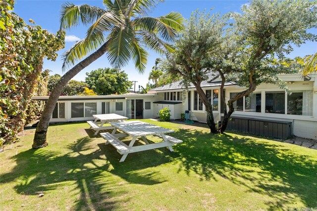 61-707 Papailoa Rd, Haleiwa, HI 96712 - back of property with a lawn