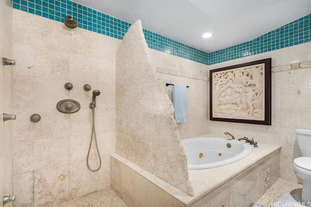 bathroom featuring tile walls, shower with separate bathtub, and toilet