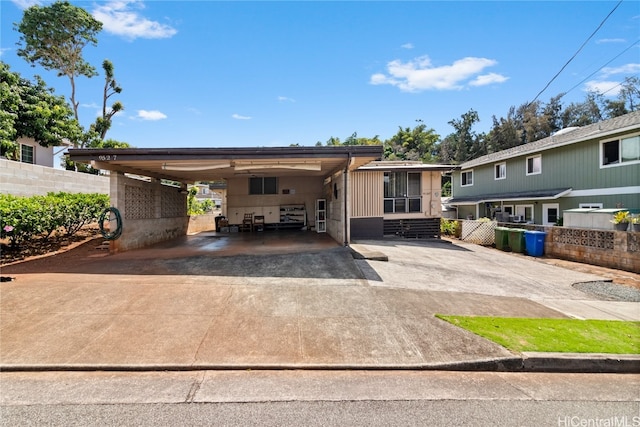 view of front of house with a carport