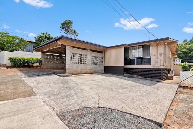 view of front of house featuring a carport