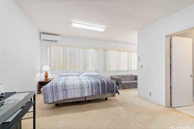 carpeted bedroom with an AC wall unit