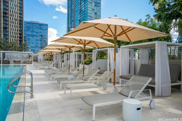 view of patio / terrace featuring a community pool