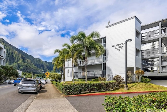 view of building exterior featuring a mountain view