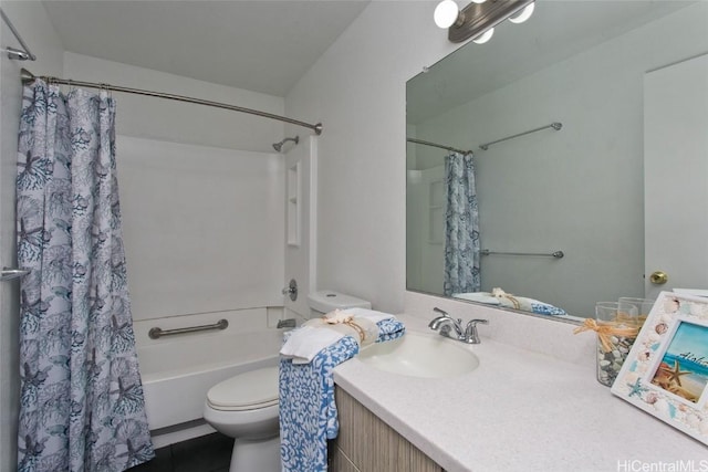 full bathroom with shower / bath combo, vanity, and toilet