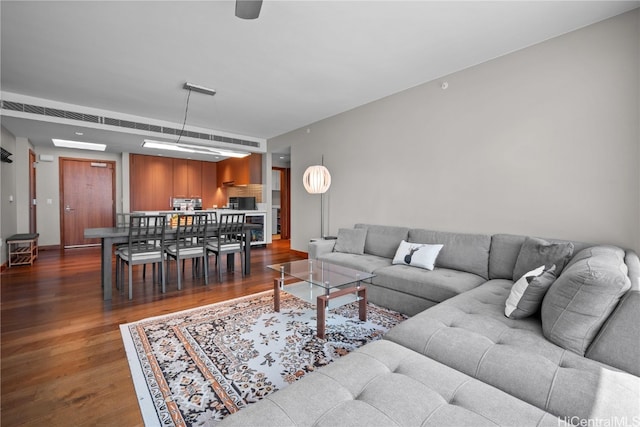 living room featuring dark hardwood / wood-style flooring