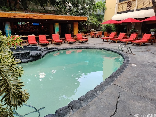 view of pool with a patio