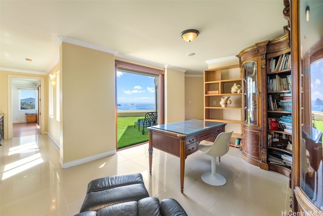 playroom with ornamental molding, a healthy amount of sunlight, and light tile patterned floors