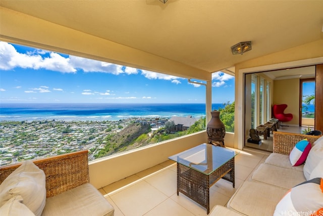 balcony featuring a water view