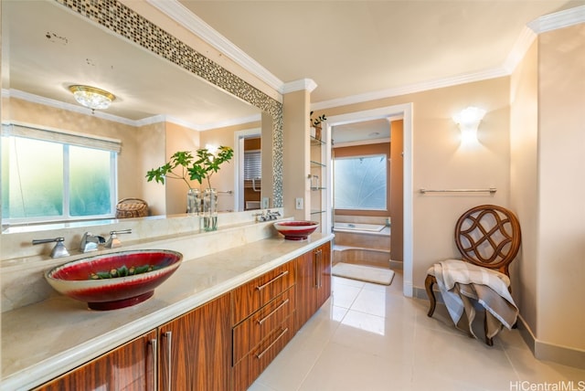 bathroom with vanity, ornamental molding, and tile patterned flooring