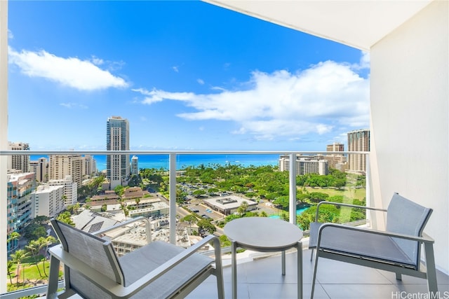 balcony featuring a water view