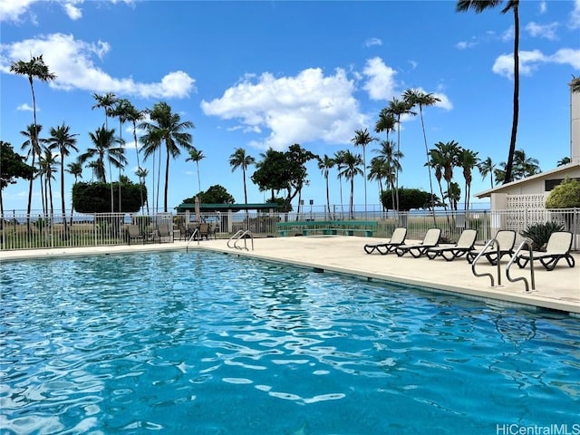 view of swimming pool featuring a patio area