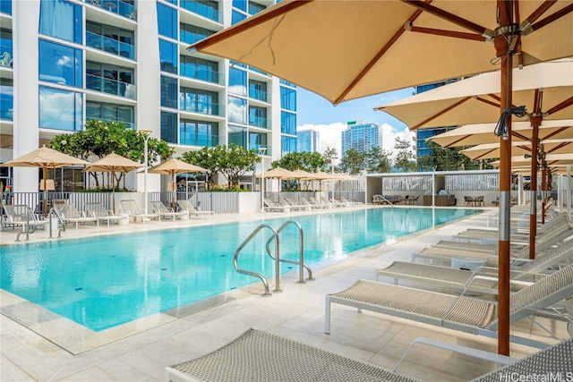 view of swimming pool with a patio area