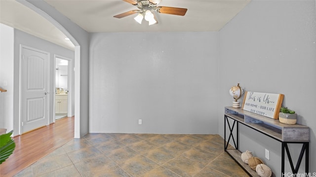 interior space featuring hardwood / wood-style flooring and ceiling fan