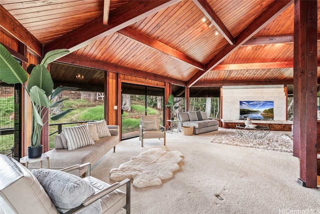 interior space featuring vaulted ceiling with beams and wood ceiling