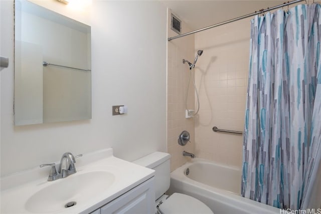 full bathroom featuring toilet, shower / bath combo, and vanity