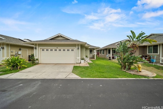 single story home with a front yard and a garage