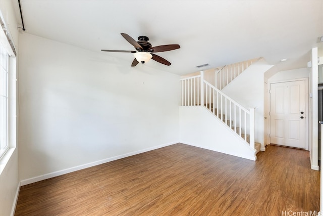 spare room featuring ceiling fan and hardwood / wood-style floors