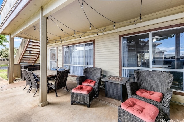 view of patio featuring an outdoor fire pit