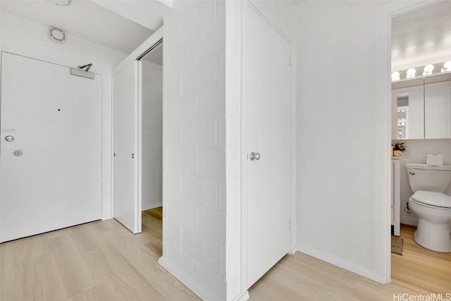 bathroom featuring toilet and hardwood / wood-style floors