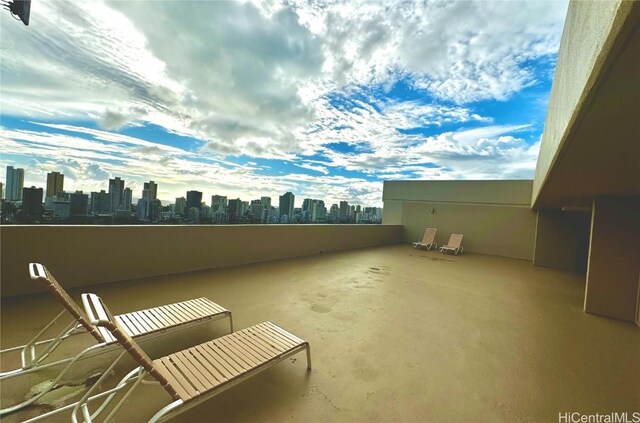 view of patio / terrace with a balcony