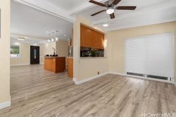 unfurnished living room with light hardwood / wood-style flooring, beam ceiling, and ceiling fan