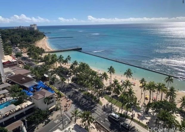 bird's eye view featuring a view of the beach and a water view