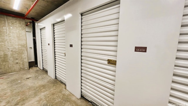 corridor featuring concrete floors