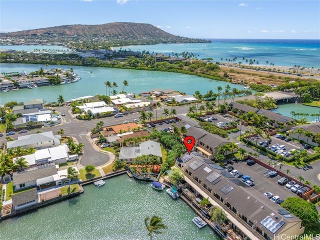 bird's eye view with a water and mountain view