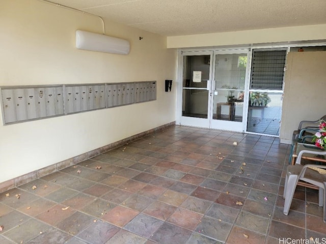 view of patio featuring an AC wall unit