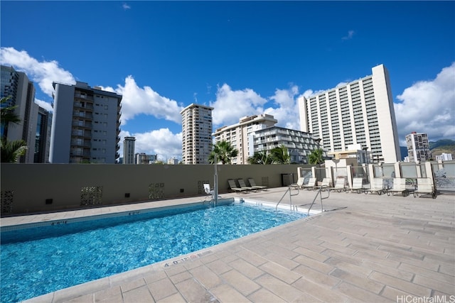 view of pool featuring a patio