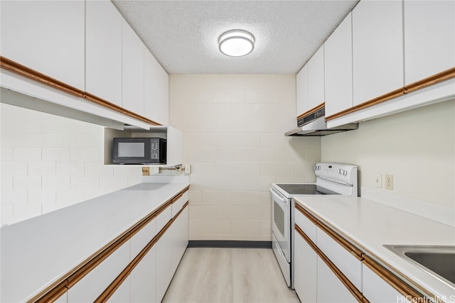 kitchen with white cabinetry, a textured ceiling, light hardwood / wood-style flooring, and white range with electric stovetop