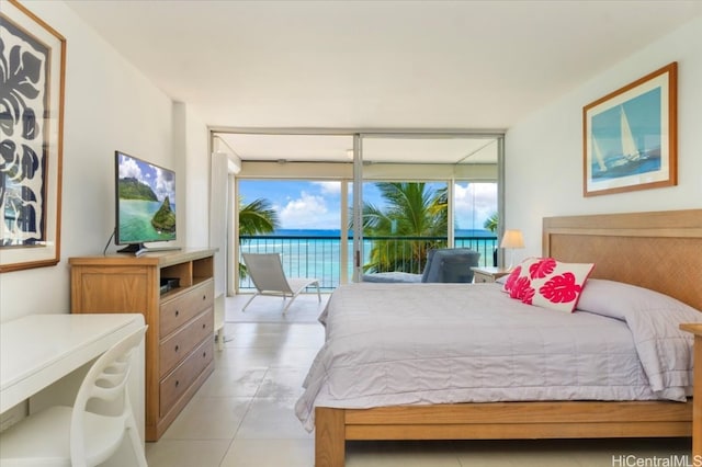 tiled bedroom featuring access to outside