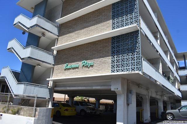 view of building exterior with a carport